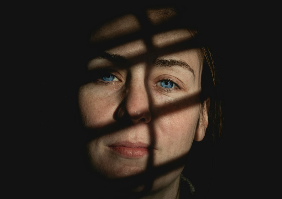 Studio portrait of a Swiss-European woman in her 30s, environmental correspondent
